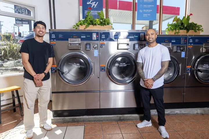 Brian, left, and Jonathan inside The Laundry Hub at 5090 Mission Street in San Francisco.